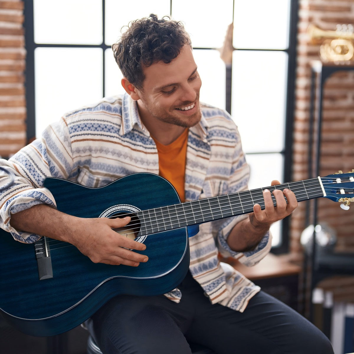 Elegant design of the WINZZ full-size classic guitar, perfect for adults and learners.