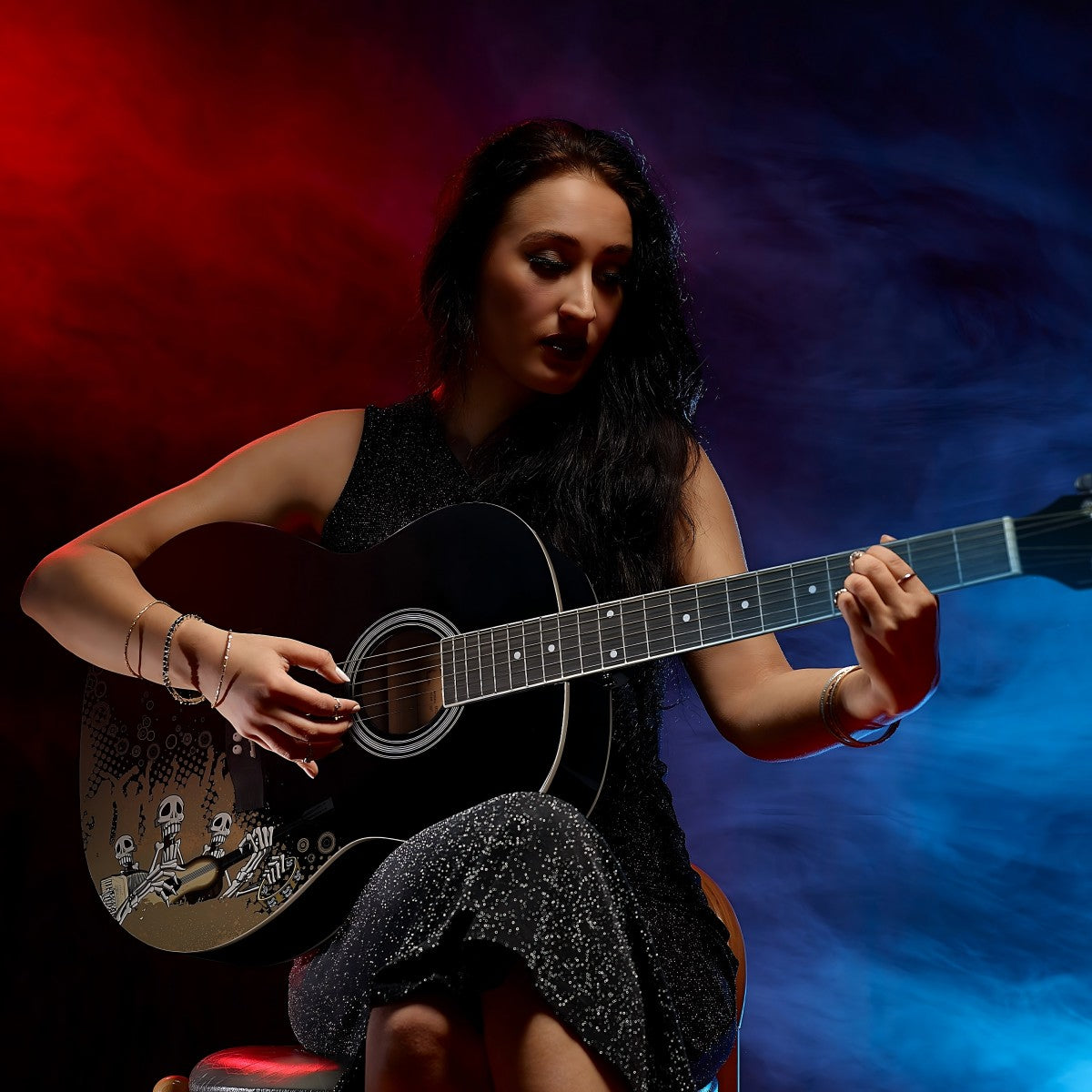WINZZ AF227A acoustic guitar with Rock Skull design, ideal for musicians who love standout aesthetics.