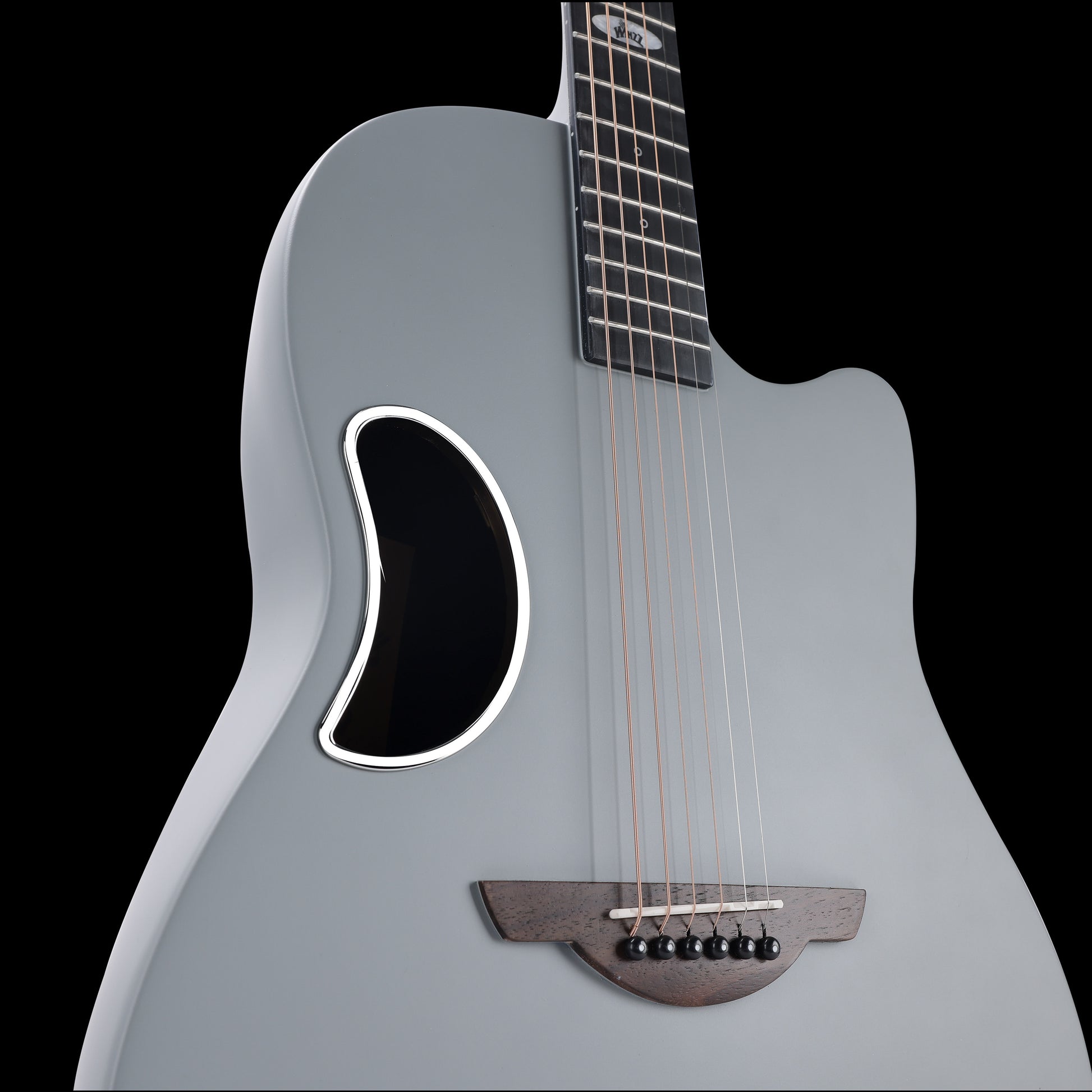 WINZZ AFO300C matte grey acoustic guitar with a solid spruce top and carbon fiber back, delivering a rich tone with enhanced strength and lightweight performance.