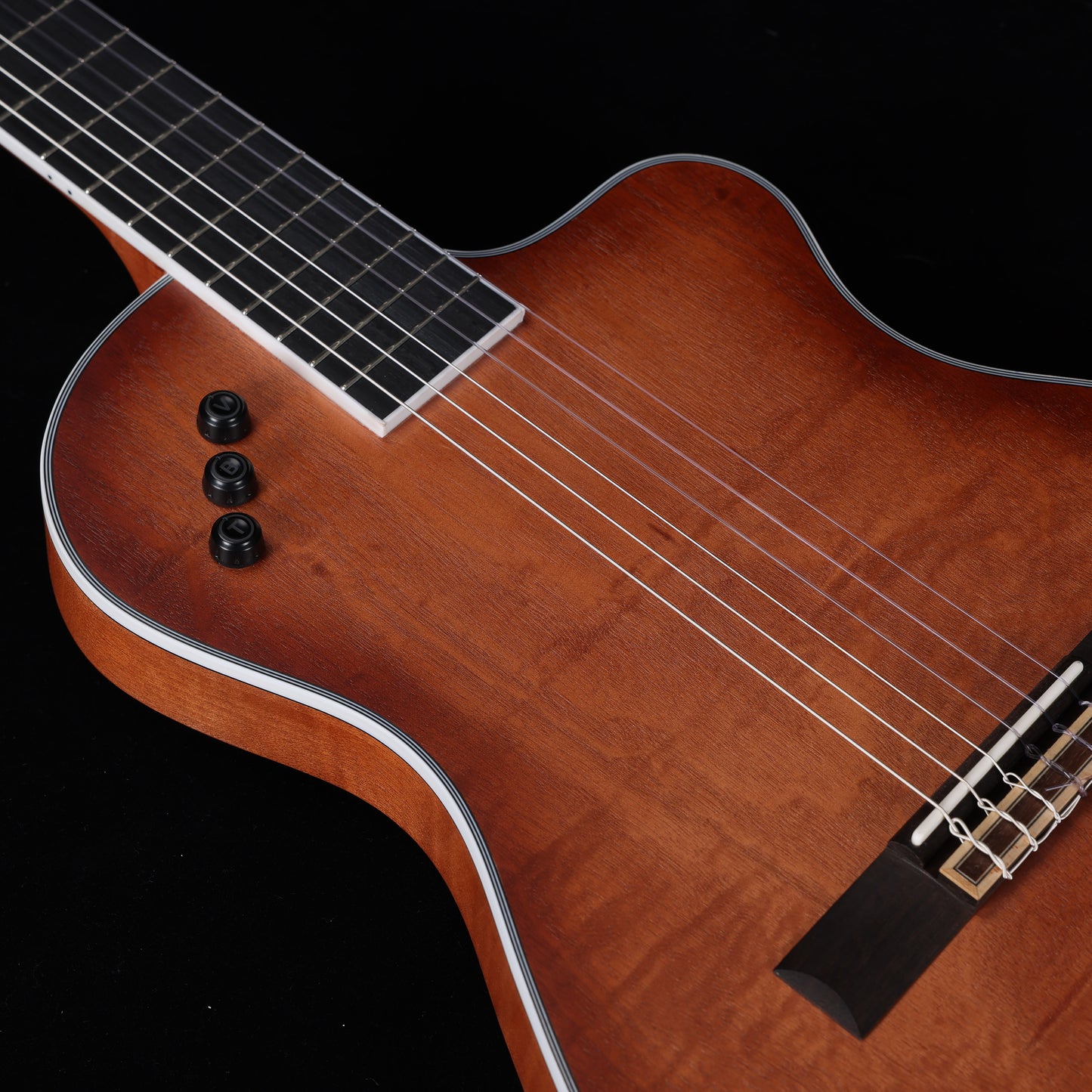 Featuring a captivating sunburst color and thin body design, the WINZZ WCG170CE nylon string guitar is perfect for performers seeking comfort, style, and quality sound