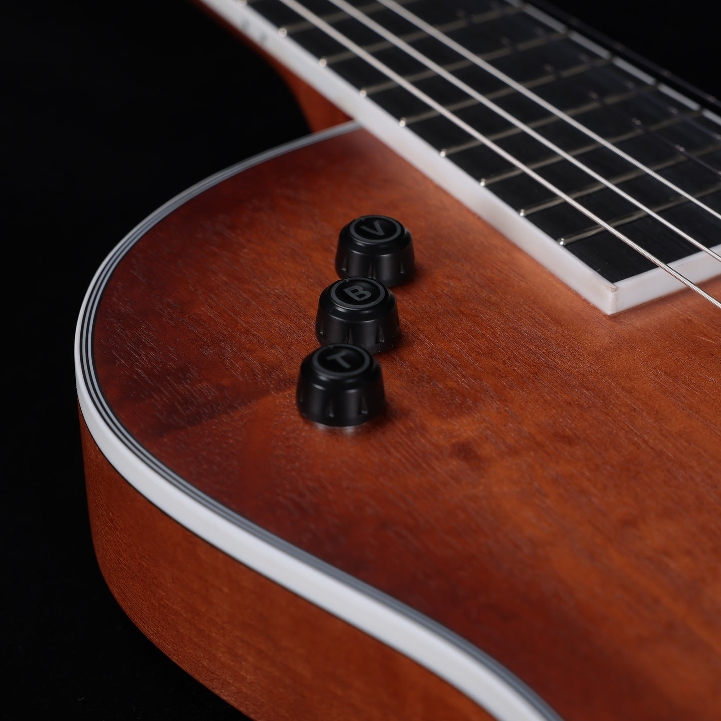 Elegant sunburst-colored WINZZ WCG170CE guitar, crafted with a thin body and nylon strings, offering both exceptional sound quality and a distinctive visual appeal for classical guitarists
