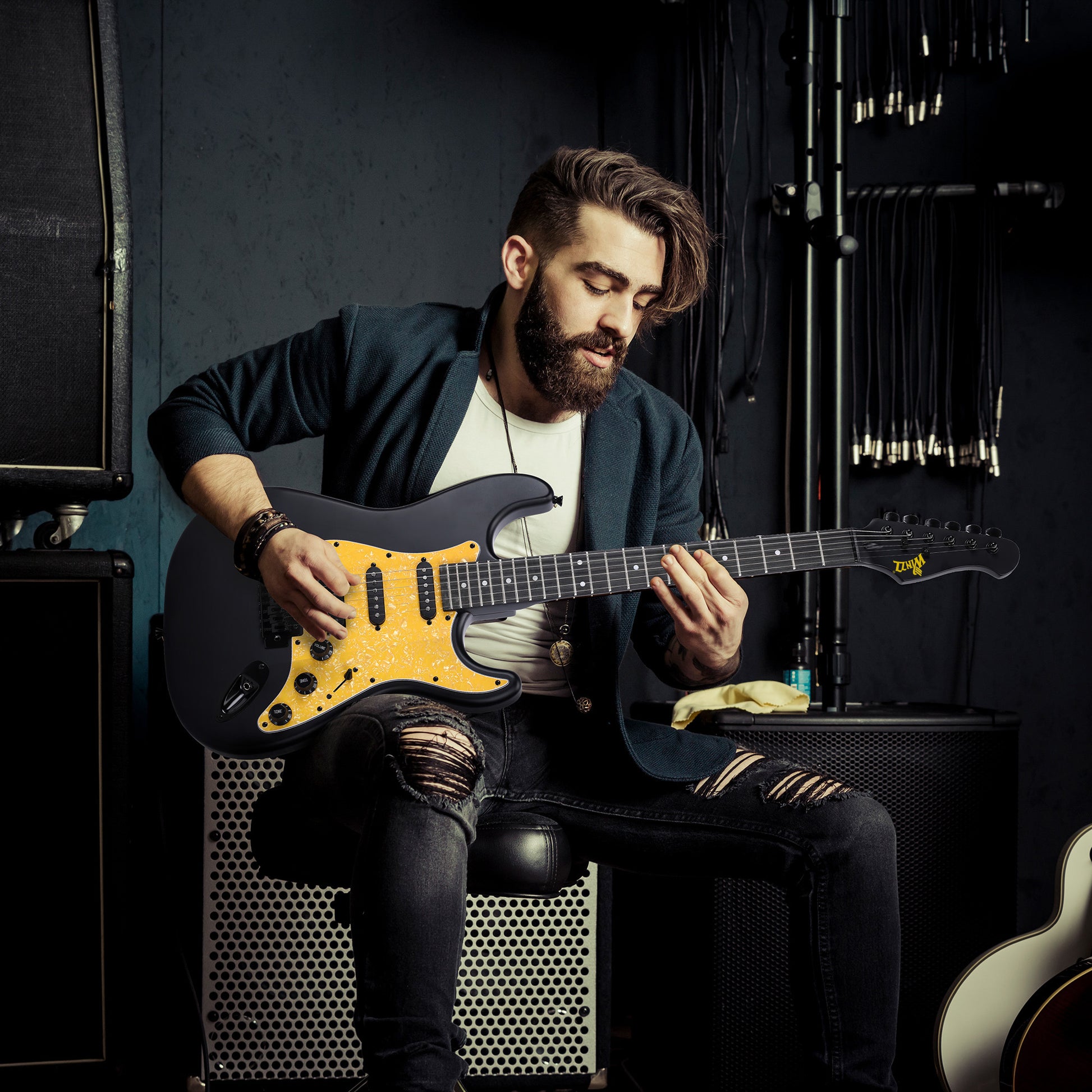 WINZZ EGS112H electric guitar with blue pickguard, equipped with a strap for comfortable use, offering a versatile and stylish instrument suitable for various musical genres